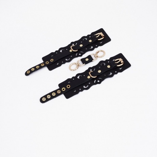 Черные кожаные наручники с узорами и золотистой фурнитурой - Crazy Handmade - купить с доставкой в Уфе